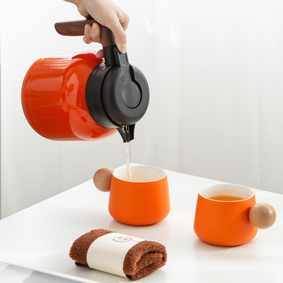 Presentación personalizada Conjunto de regalos tetera cerámica 2 tazas Toalla de té 6 trozos de té blanco