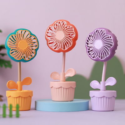 Productos de oficina ventilador de plantas en maceta recargable en dibujos animados con diseño de flores para el verano