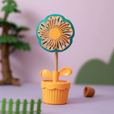 Productos de oficina ventilador de plantas en maceta recargable en dibujos animados con diseño de flores para el verano