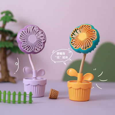 Productos de oficina ventilador de plantas en maceta recargable en dibujos animados con diseño de flores para el verano