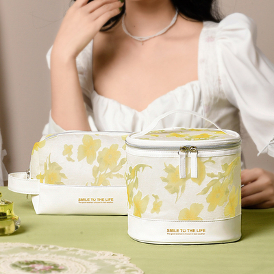 Presentación elegante Conjunto de regalos Bolsa de aseo de gran capacidad con cilindro de flores oculto