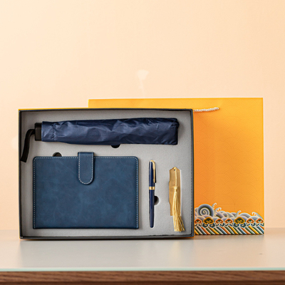 Conjunto de regalos de negocios de cuatro piezas Cuaderno de bolígrafo Bookmark y paraguas con logotipo personalizado