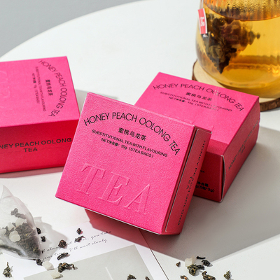 Relaciones con los ex alumnos Té regalo melocotón té oolong en embalaje de estampado en caliente Actividad del 8 de marzo