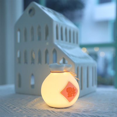 Regalo para el festival Bolso de suerte creativo con luz LED con dos niveles de atenuación