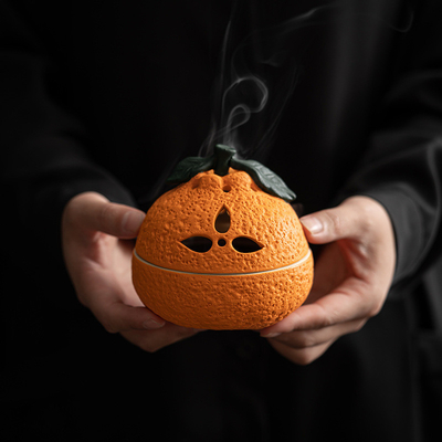 La estufa de aromaterapia naranja Dajidali es imprescindible para el mobiliario y la relajación del hogar