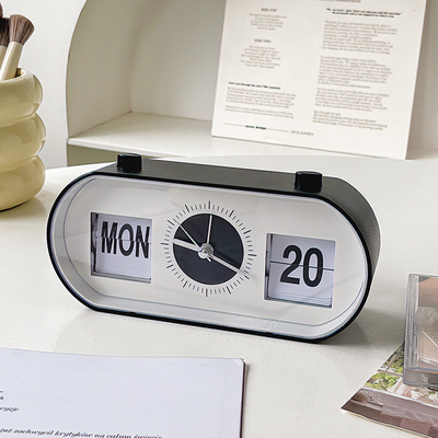 Reloj de alarma de escritorio con botón manual con calendario de página creativa