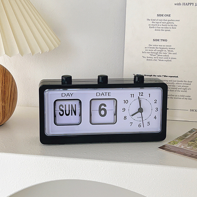 Reloj de alarma de escritorio con botón manual con calendario de página creativa