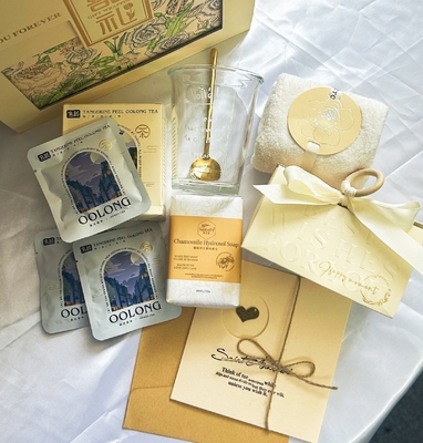 Conjunto de regalos personalizados para bodas Toallas, jabón, taza de agua, té oolong y una caja de caramelos creativa